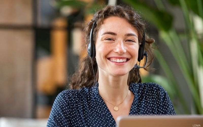 Customer Support rep woman handling incoming clients calls for long distance moving company